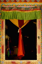 India, Sikkim, decorated door in Buddhist monastery.