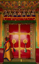 India, Sikkim, hand crafted and painted door in Buddhist Monastery.
