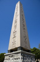 Turkey, Istanbul, Sultanahmet, The Roman Hippodrome in At Meydani with Egyptian Obelisk with Hieroglyphics from Luxor and relief at base showing Theodosius I and courtiers.