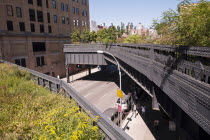 USA, New York, Manhattan, West Side, High Line, a section of the original rail line preserved on the a public park built on an historic freight rail line elevated above the streets.