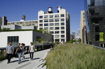 USA, New York, Manhattan, West Side, the Highline Park north of 23th St with people strolling.