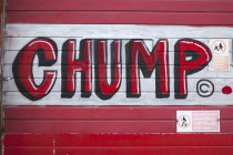 Art, Graffiti, former parcel delivery warehouse converted into roller disco with the walls decorated by local graffiti artists. Chump written in red paint.