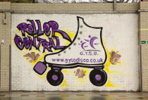 Art, Graffiti, former parcel delivery warehouse converted into roller disco with the walls decorated by local graffiti artists. Skate painted on wall advertising GYSO.