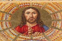 Italy, Sicily, Messina, Piazza Del Duomo, Jesus Christ mosaic inside Cathedral.