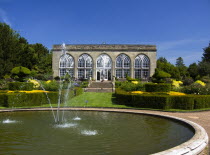 England, Warwickshire, Warwick Castle - Fountain and Conservatory in Peacock Garden.    