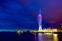 England, Hampshire, Portsmouth, Spinnaker Tower illuminated at night.