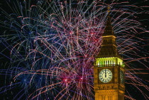 England, London, New Years fireworks display behind Big Ben.