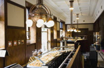 Hungary, Budapest, Restored Art Nouveau cafe interior on Andrassy Ut, premier shopping district in central Pest.