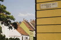 Hungary, Budapest, Street sign on corner in Buda Castle District.