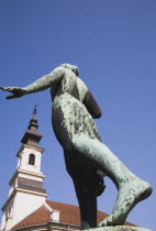 Hungary, Budapest, Buda Castle District: bronze statue in clear blue sky.