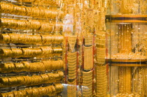 UAE , Dubai, Gold bangles and jewellery in window display of Gold Souk Deira.