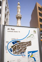 UAE , Dubai, District map of Al Ras area of Deira with minaret of mosque behind.