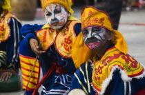 Thailand, Bangkok, Thai boys in Chinese character costume in dance troupe celebrating local temple.