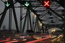 Thailand, Bangkok, Traffic flow control in evening rush hour on Saphan Phut Memorial Bridge.