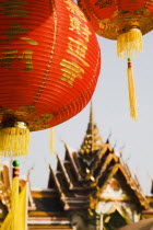 Thailand, Bangkok, Wat Yannawa temple roof and  red lantern at Chinese New Year.