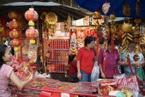 Thailand, Bangkok, shop at stall with Red Lanterns and Decorations for Chinese New Year.