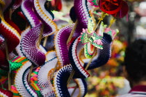 Thailand, Bangkok, Children's toy dragon on stall in Chinatown for Chinese New Year.