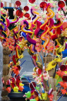 Thailand, Bangkok, Children's toy dragons on stall in Chinatown for Chinese New Year.