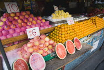 Thailand, Bangkok, Fresh fruit stall in shade.