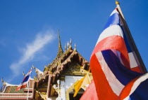 Thailand, Bangkok, Flag of Thailand with Wat Yannawa behind.