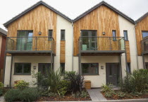 England, West Sussex, Chichester, Graylingwell Park, Modern housing with solar panels blended seamlessly in to roof tiles.