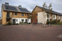 England, West Sussex, Chichester, Graylingwell Park, Modern housing with solar panels blended seamlessly in to roof tiles.