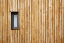 England, West Sussex, Chichester, Graylingwell Park, detail of wood cladding on the exterior of the modern eco friendly house.