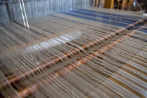 Greece, Ioannina, Zagorohoria, Close of an old traditional loom with cotton lined threads.