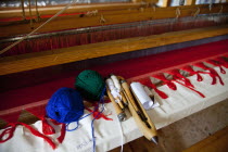 Greece, Ioannina, Zagorohoria, Close of an old traditional loom with balls of wool and tools.