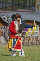 Canada, Alberta, Waterton Lakes National Park, Blackfoot dancer in a buffalo headdress at the Blackfoot Arts & Heritage Festival Pow Wow organized by Parks Canada and the Blackfoot Canadian Cultural S...