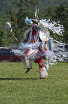 Canada, Alberta, Waterton Lakes National Park, Blackfoot dancer in the Fancy Dance at the Blackfoot Arts & Heritage Festival Pow Wow organized by Parks Canada and the Blackfoot Canadian Cultural Socie...