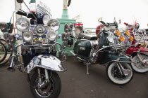 England, East Sussex, Brighton, Elaborately decorated Mopeds on Madeira Drive during motorbike festival.