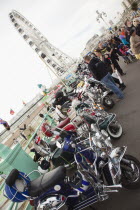 England, East Sussex, Brighton, Elaborately decorated Mopeds on Madeira Drive during motorbike festival.