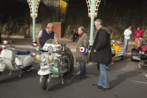 England, East Sussex, Brighton, Elaborately decorated Mopeds on Madeira Drive during motorbike festival.