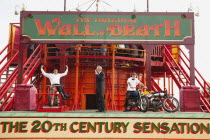 England, East Sussex, Brighton, Wall of death motorcycle fairground attraction on Madeira Drive during motorbike festival.