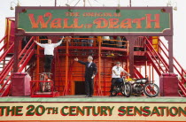 England, East Sussex, Brighton, Wall of death motorcycle fairground attraction on Madeira Drive during motorbike festival.