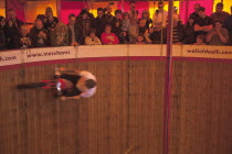 England, East Sussex, Brighton, Wall of death motorcycle fairground attraction on Madeira Drive during motorbike festival.