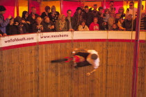 England, East Sussex, Brighton, Wall of death motorcycle fairground attraction on Madeira Drive during motorbike festival.