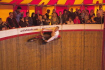 England, East Sussex, Brighton, Wall of death motorcycle fairground attraction on Madeira Drive during motorbike festival.