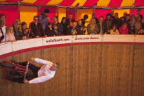 England, East Sussex, Brighton, Wall of death motorcycle fairground attraction on Madeira Drive during motorbike festival.