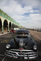 England, East Sussex, Brighton, Old American Pontiac automobile on Madeira Drive during classic car festival.