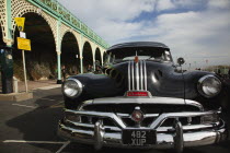 England, East Sussex, Brighton, Old American Pontiac automobile on Madeira Drive during classic car festival.