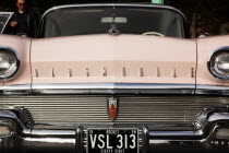 England, East Sussex, Brighton, Old American Oldsmobile on Madeira Drive during classic car festival.