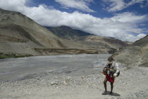 Nepal, Upper Mustang, Kali Gandaki gorge, Nepalese returns from a worship at the Upper Mustang region.