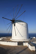 Greece, Cyclades Islands, Sifnos Island, Artemonas village, Old wind mill which is now converted to accomodation on the top of a cliff.