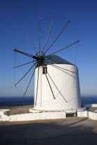 Greece, Cyclades Islands, Sifnos Island, Artemonas village, Old wind mill which is now converted to accomodation on the top of a cliff.