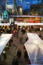 England, London, Camden Lock Market, Looking down on early evening Christmas shoppers.