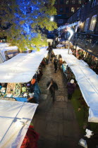 England, London, Camden Lock Market, Looking down on early evening Christmas shoppers.