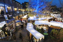 England, London, Camden Lock Market, Looking down on early evening Christmas shoppers.