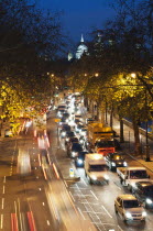 England, London, Rush hour traffic along the Embankment with St Paul's Cathedral in the background.
